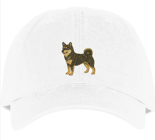 Black and tan Shiba embroidery on a white cotton hat